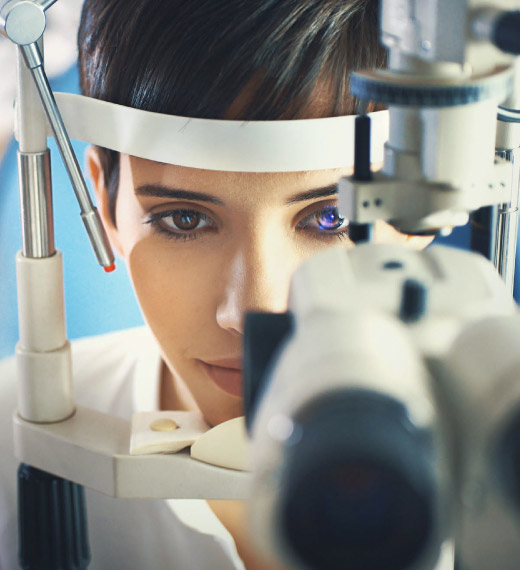 Woman getting an eye exam.