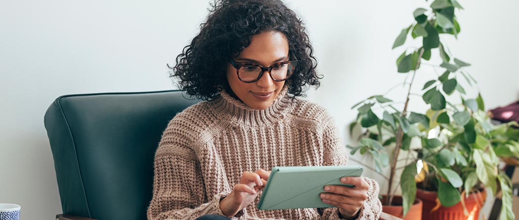 Woman using tablet.