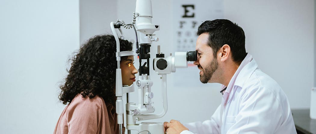 Woman getting an eye exam.